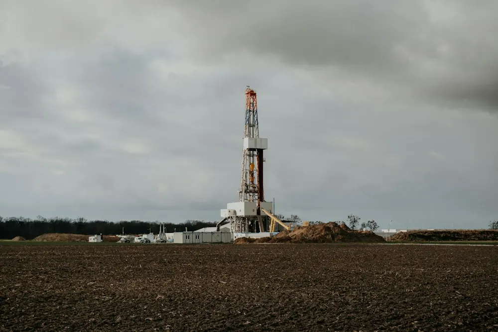 Drilling rig standing in an open field